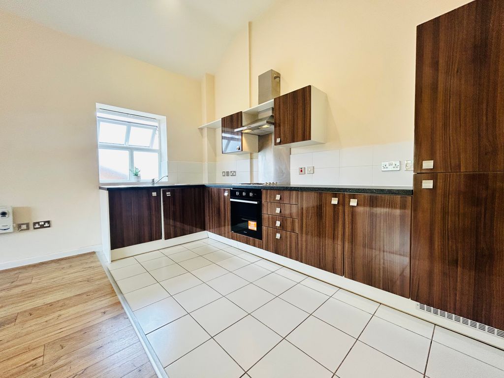 Property photo 3 of 7 Kitchen