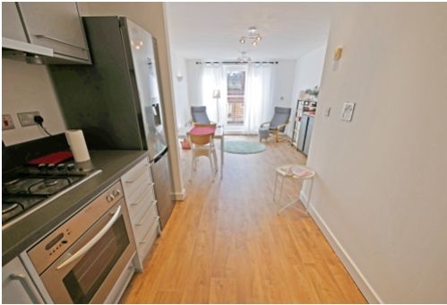 Property photo 2 of 8 Kitchen Living