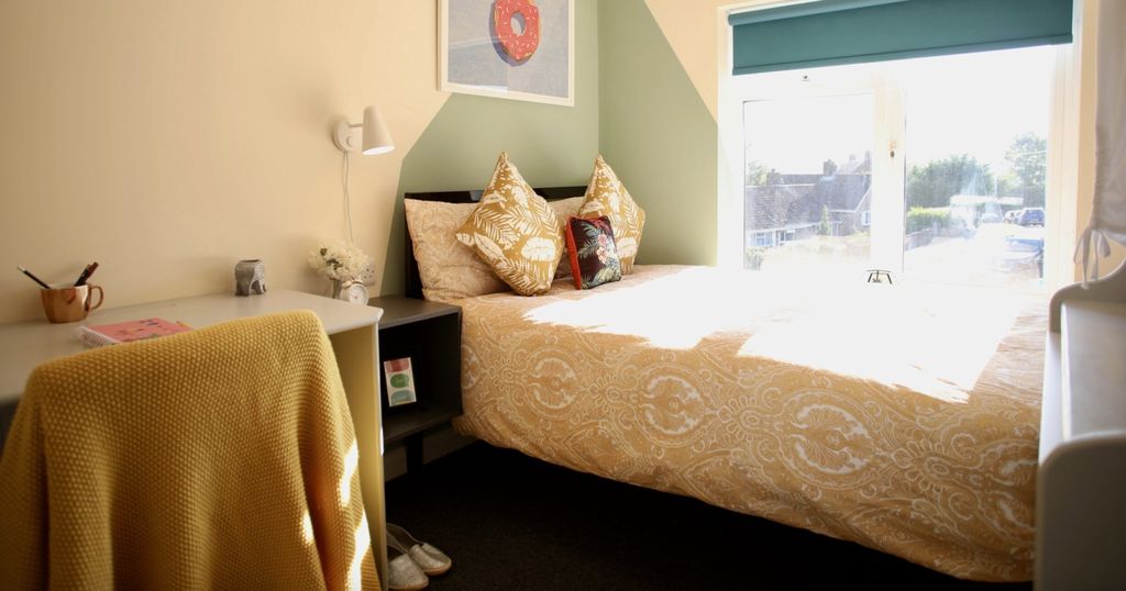 Property photo 2 of 7 A Cozy Double Bedroom Featuring A Large Window Tha...