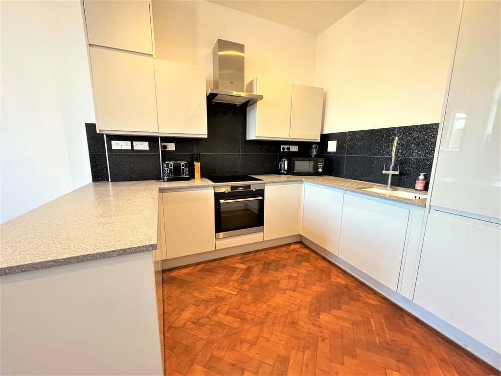 Property photo 2 of 9 Kitchen