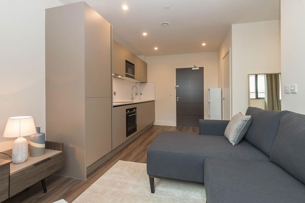 Property photo 2 of 13 Living Area