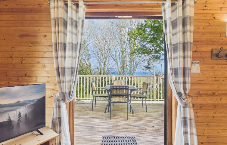 Property photo 3 of 10 Logde Lounge Opening Onto Private Decking Through Large Patio Doors