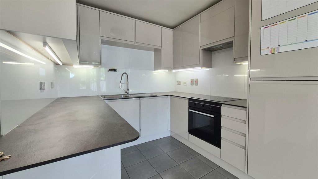 Property photo 2 of 16 Kitchen Area