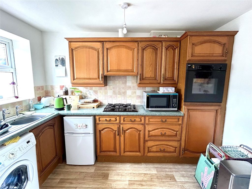 Property photo 3 of 8 Kitchen Area