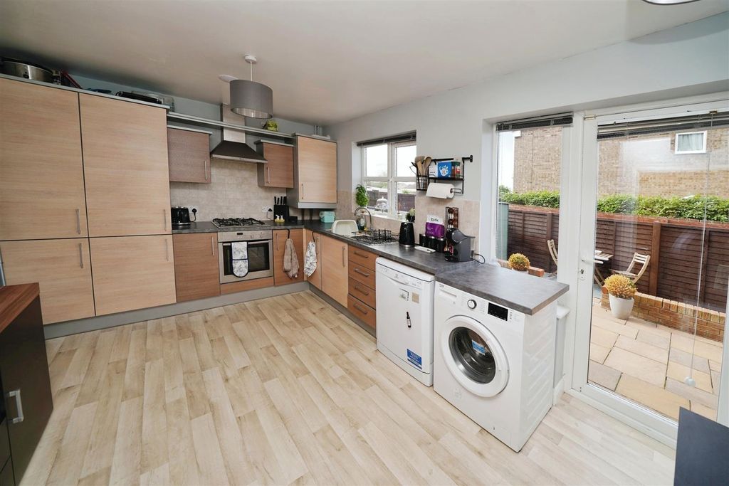 Property photo 3 of 13 Dining Kitchen