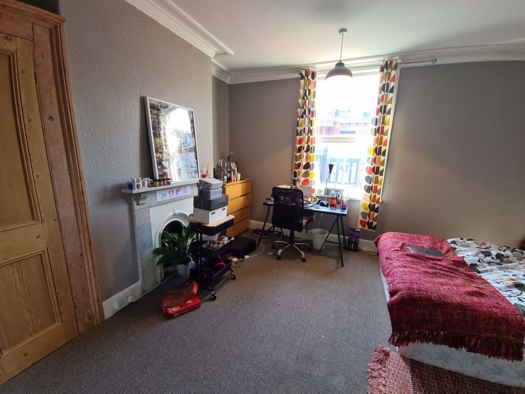 Property photo 3 of 14 Bright And Inviting Master Bedroom Featuring A Com...