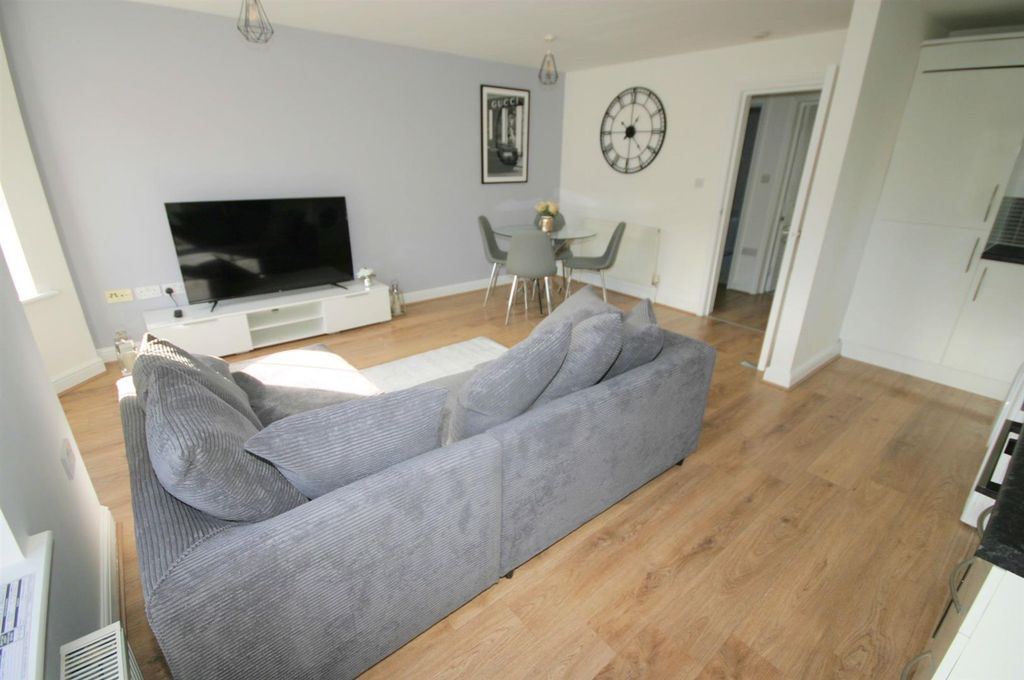 Property photo 2 of 16 Combines Open Living Room/Kitchen Area