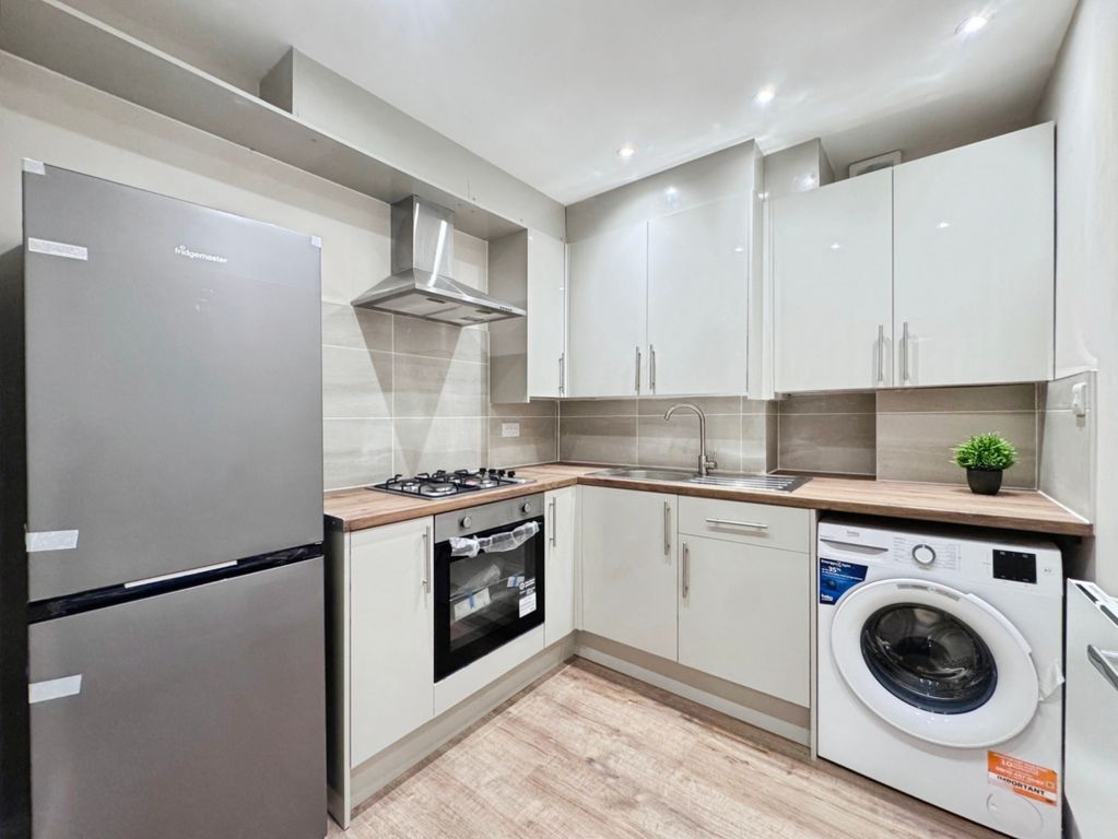 Property photo 3 of 13 Kitchen
