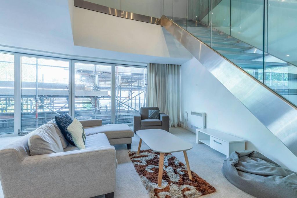 Property photo 1 of 16 Living Area