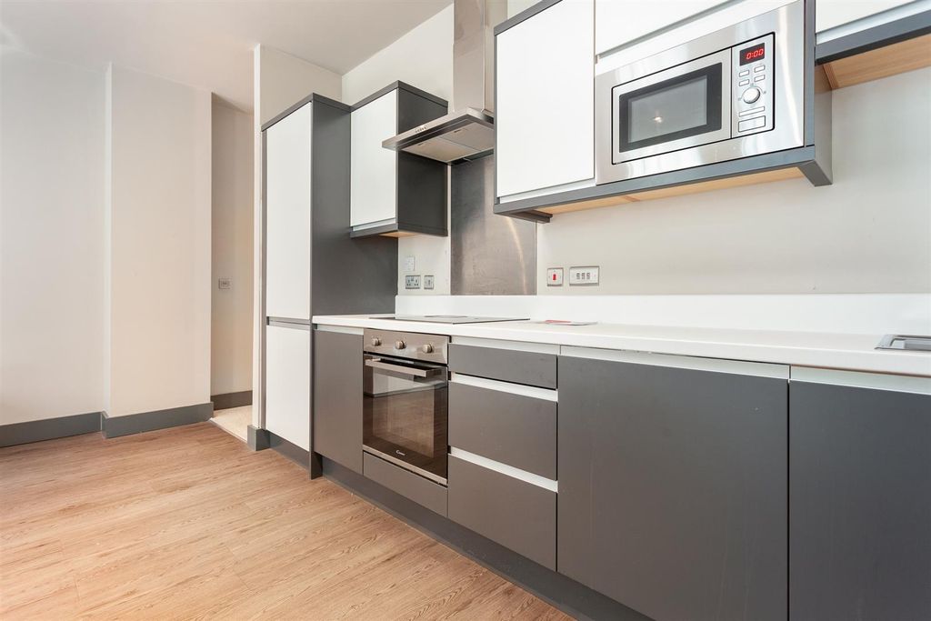 Property photo 3 of 8 Kitchen