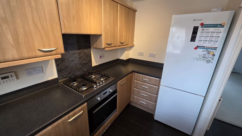 Property photo 3 of 17 Kitchen