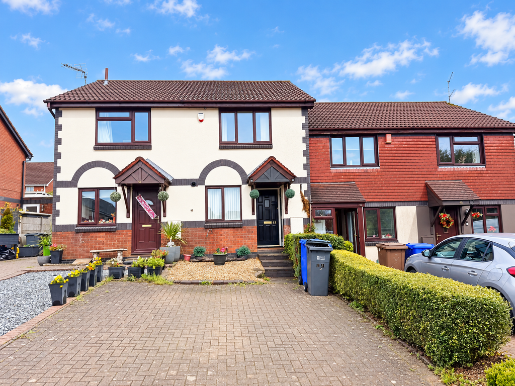Property photo 1 of 9 Sunny British Suburban Homes With Topiary And Bins
