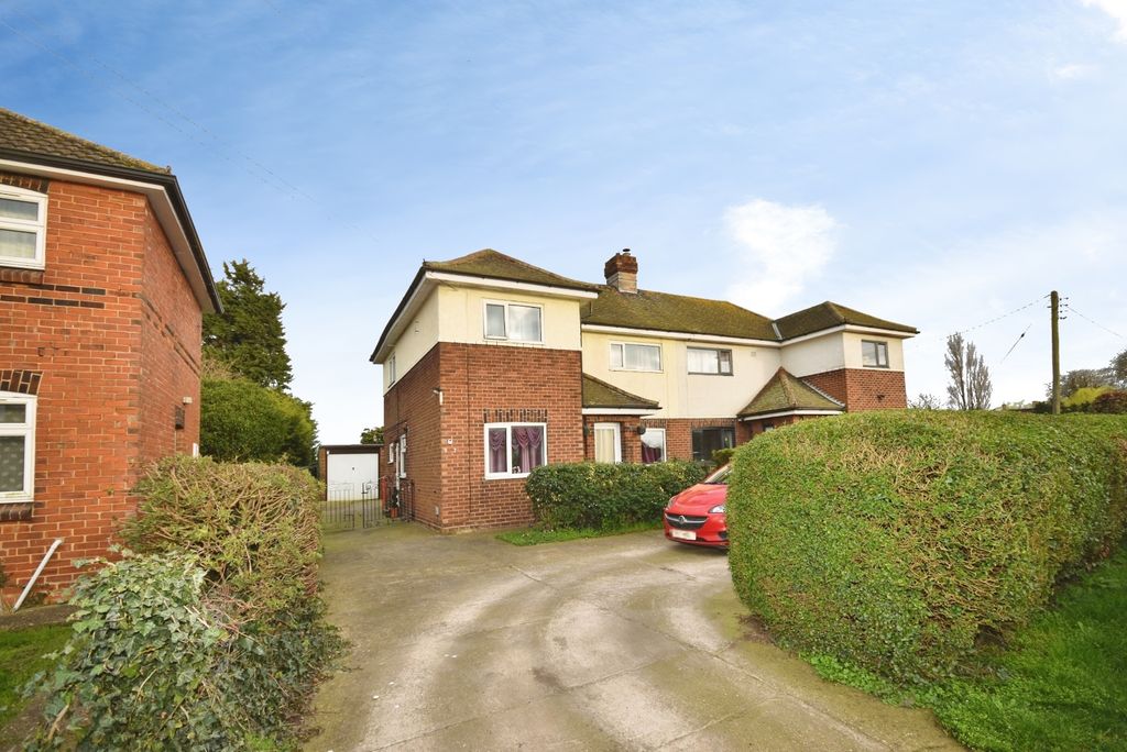 Property photo 2 of 21 Garage And Driveway