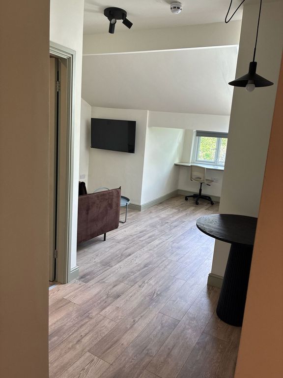 Property photo 2 of 4 Bright Modern Living Area With Integrated Study...