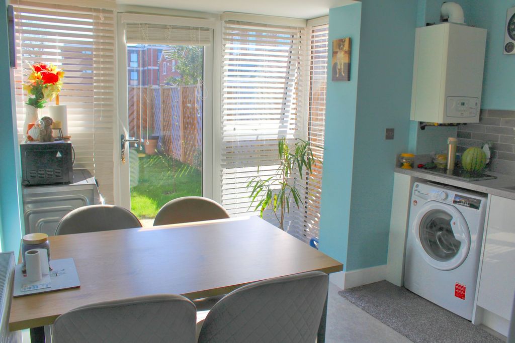 Property photo 3 of 13 Dining Kitchen