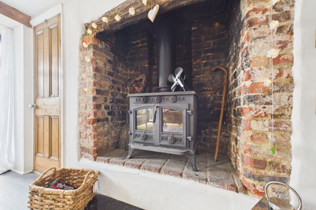 Property photo 3 of 12 Fireplace