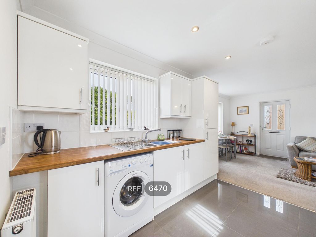 Property photo 3 of 12 Kitchen / Living Area