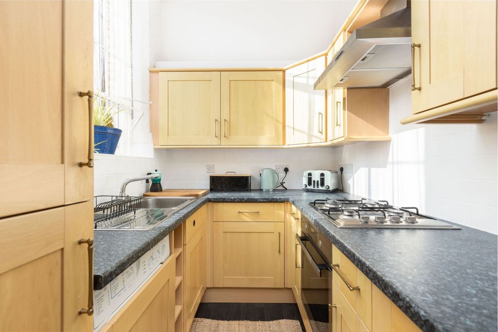 Property photo 3 of 13 Kitchen