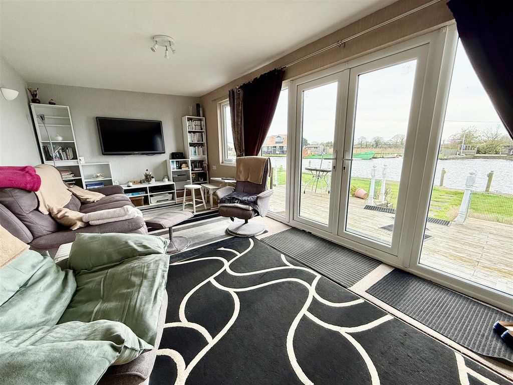 Property photo 2 of 22 Living Area