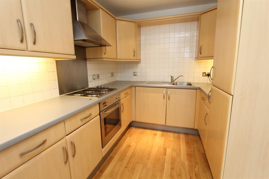 Property photo 3 of 7 Bright Kitchen With Ample Counter Space...