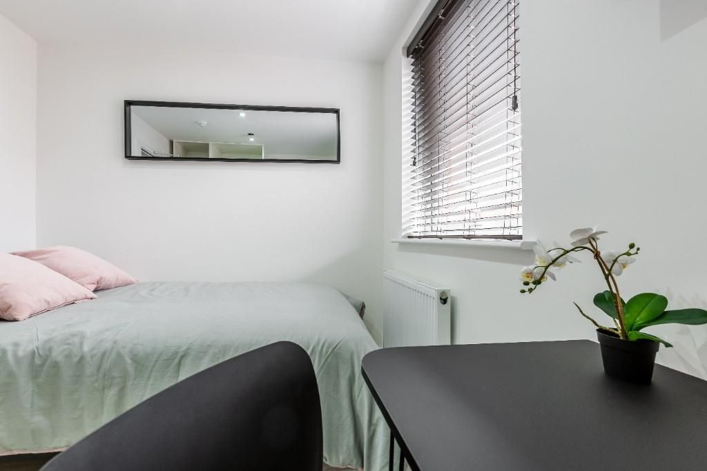 Property photo 3 of 15 A Bright, Tidy Bedroom Featuring A Comfortable Dou...
