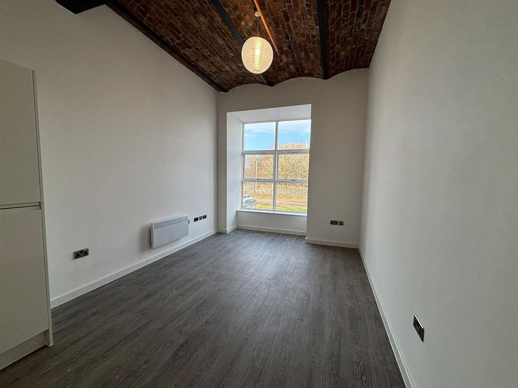 Property photo 1 of 10 Living Area