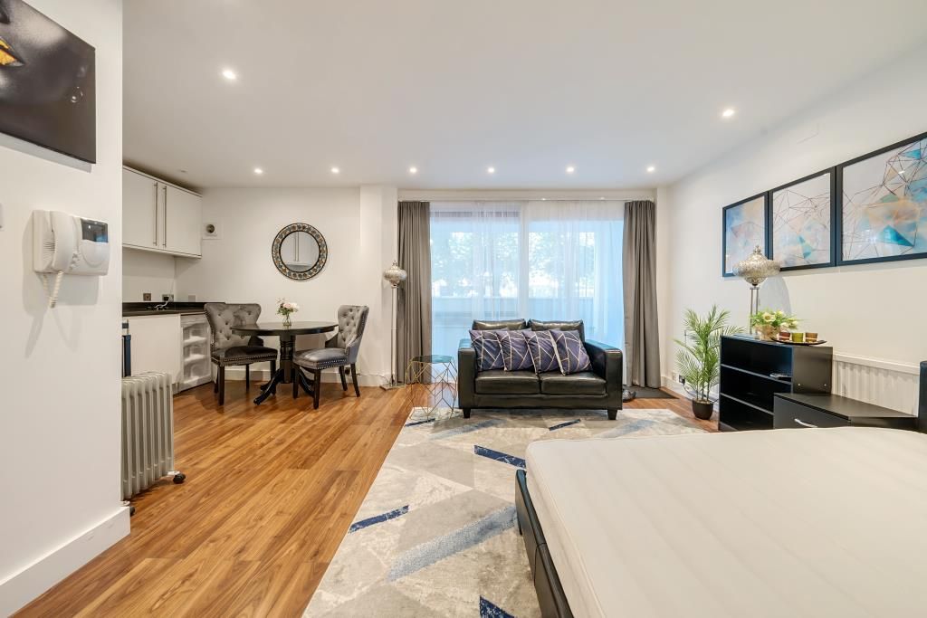 Property photo 3 of 12 Living Area