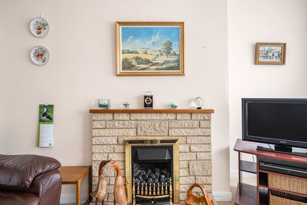 Property photo 3 of 12 Fireplace