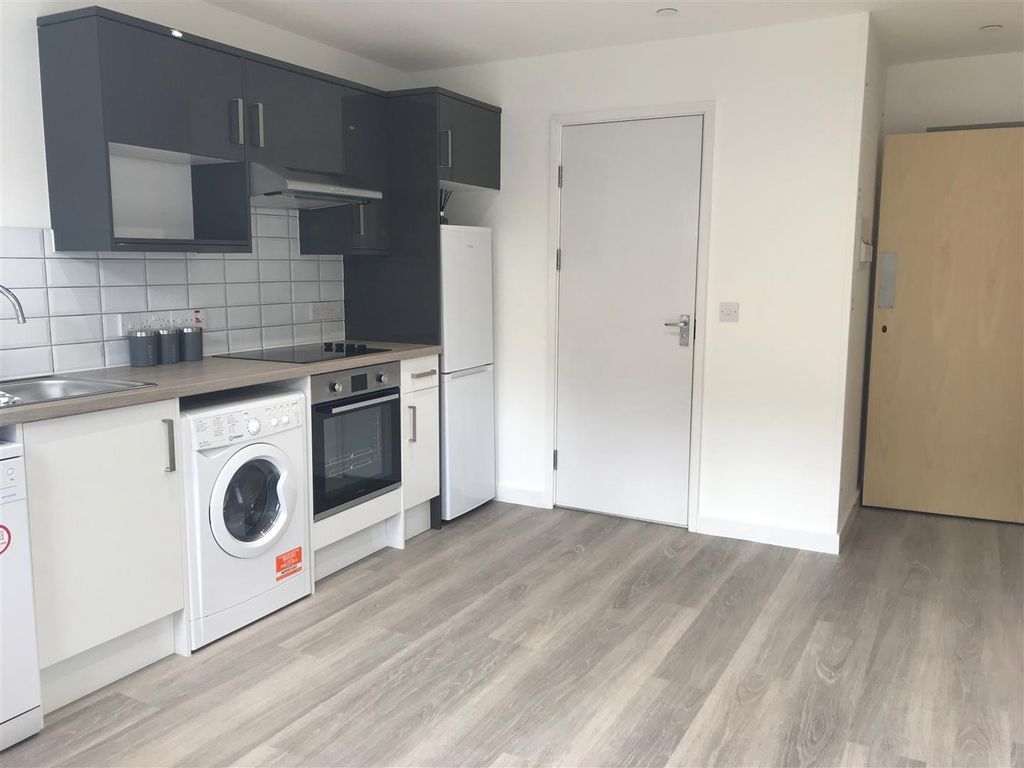 Property photo 2 of 8 Modern Kitchen With Sleek Integrated Appliances...