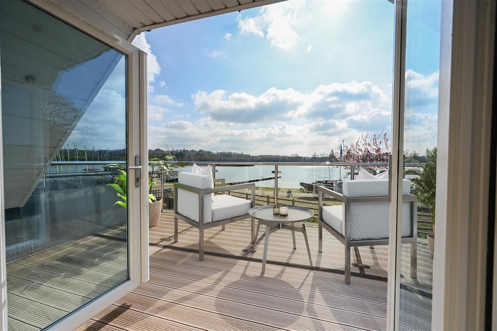 Property photo 2 of 22 Balcony View With Doors.Jpg