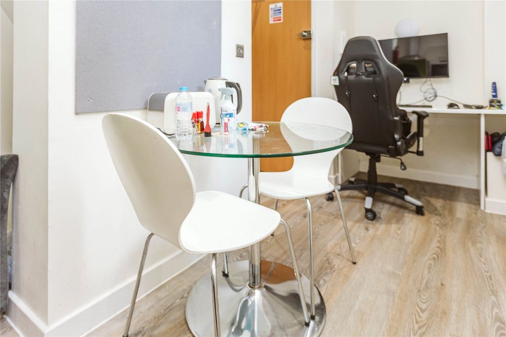 Property photo 2 of 6 Living Area