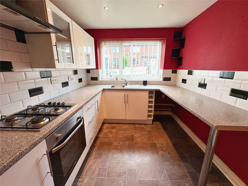 Property photo 2 of 12 Kitchen