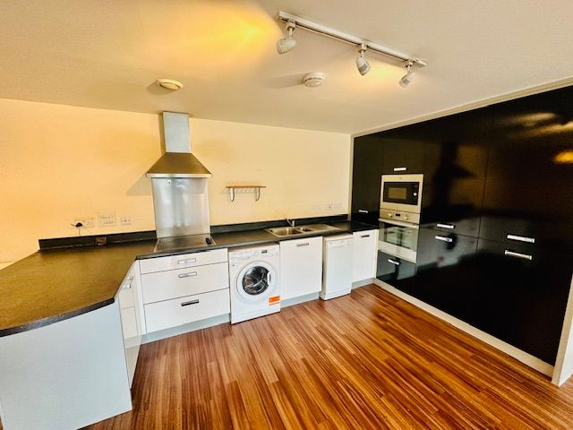 Property photo 1 of 8 Kitchen