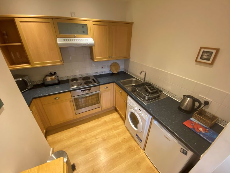 Property photo 3 of 11 Kitchen