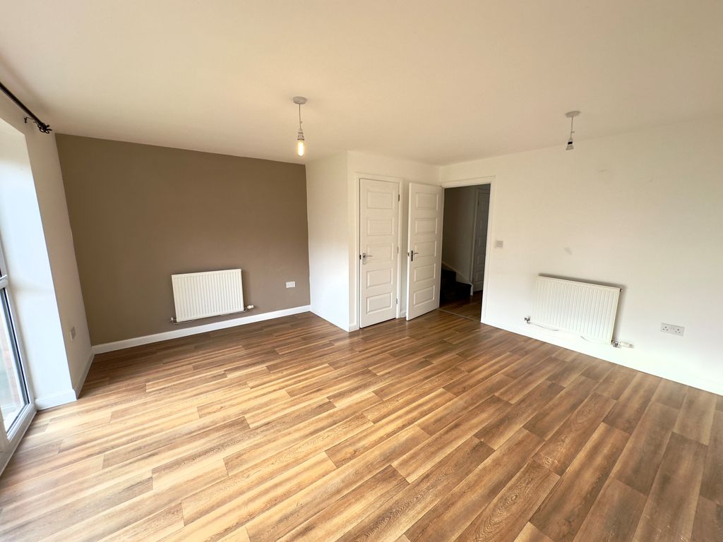 Property photo 3 of 12 Living 1