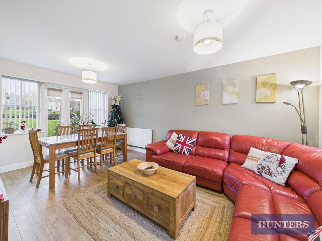 Property photo 3 of 12 Living Area