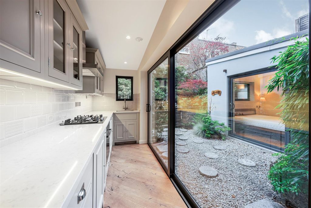 Property photo 2 of 11 Open Plan Kitchen