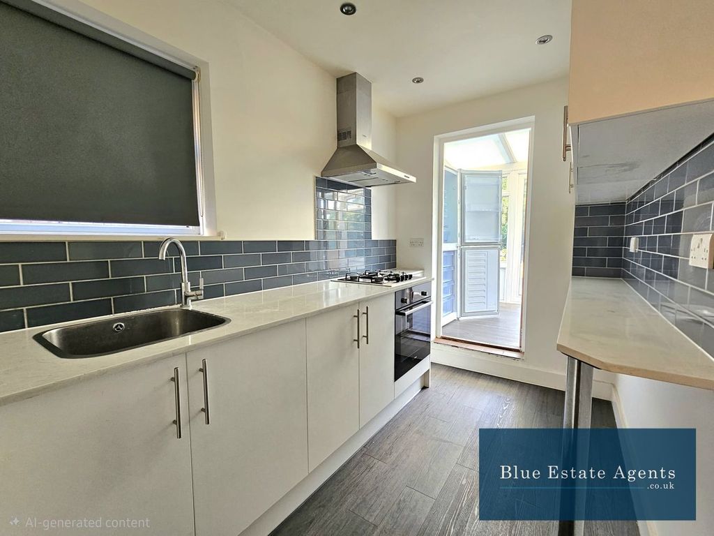 Property photo 2 of 12 Kitchen