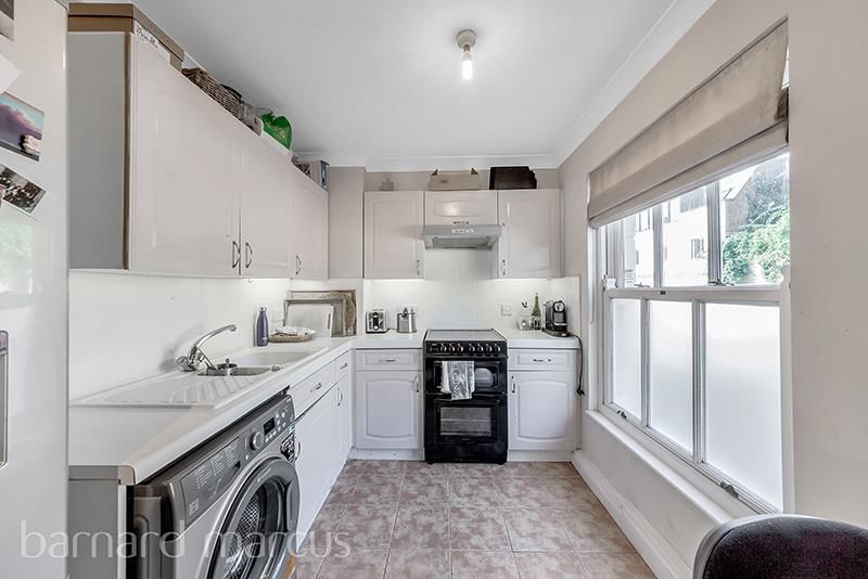 Property photo 3 of 8 Kitchen