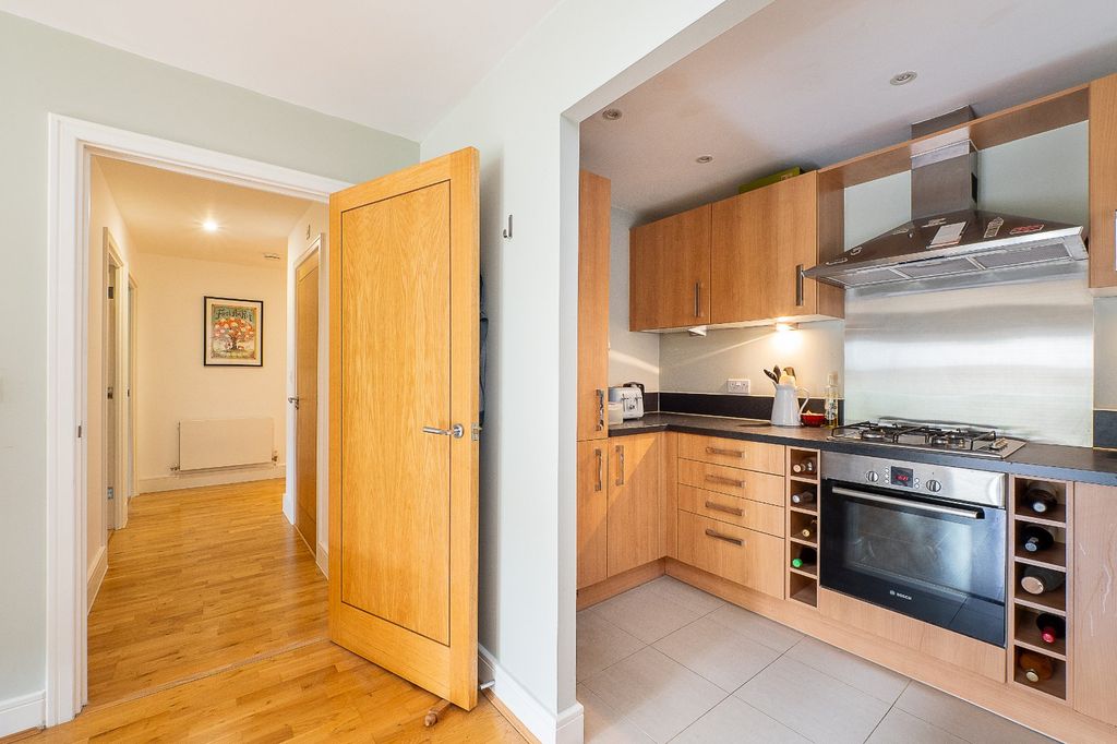 Property photo 3 of 14 Kitchen View