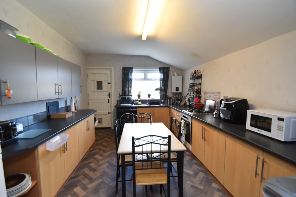 Property photo 3 of 12 Kitchen
