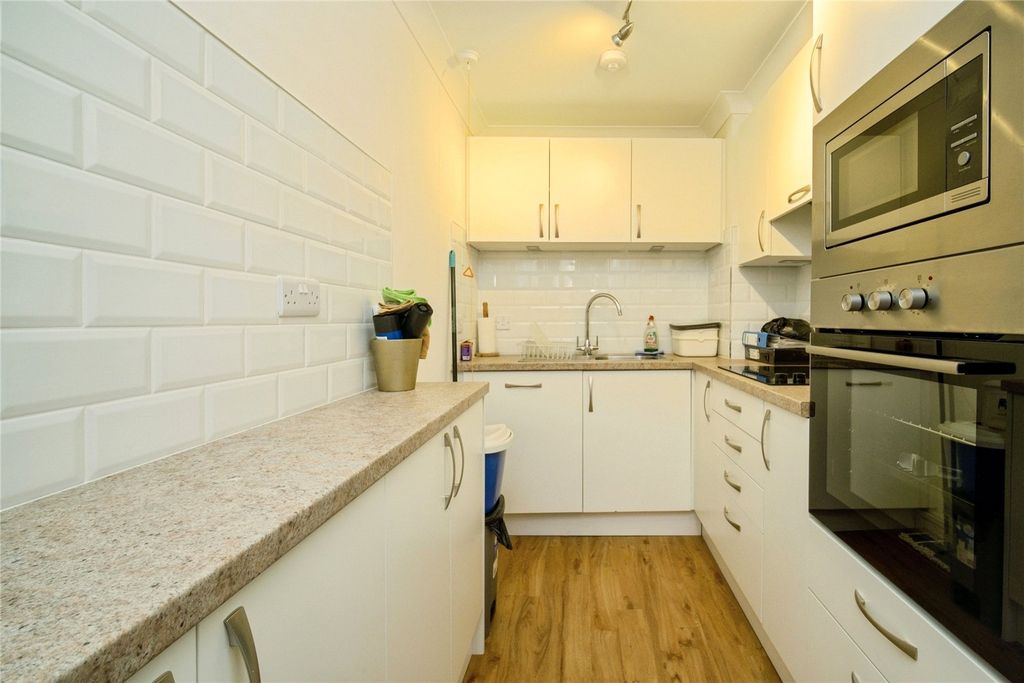 Property photo 3 of 12 Kitchen