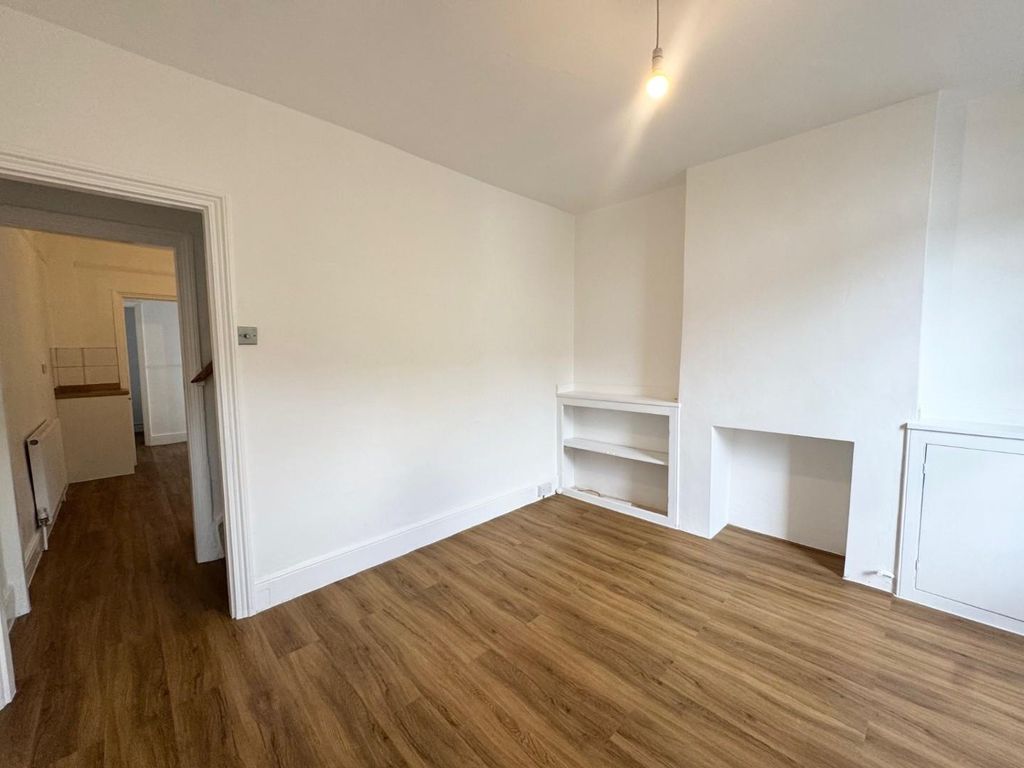 Property photo 3 of 12 Living Room Through To Kitchen.Jpg