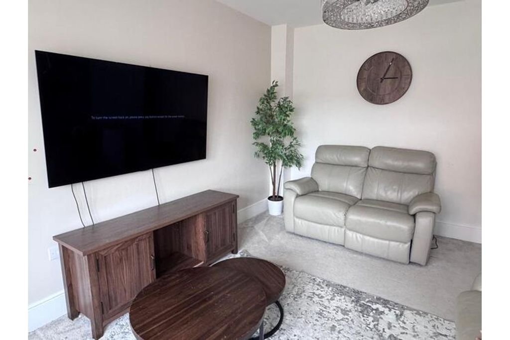 Property photo 2 of 11 Living Area