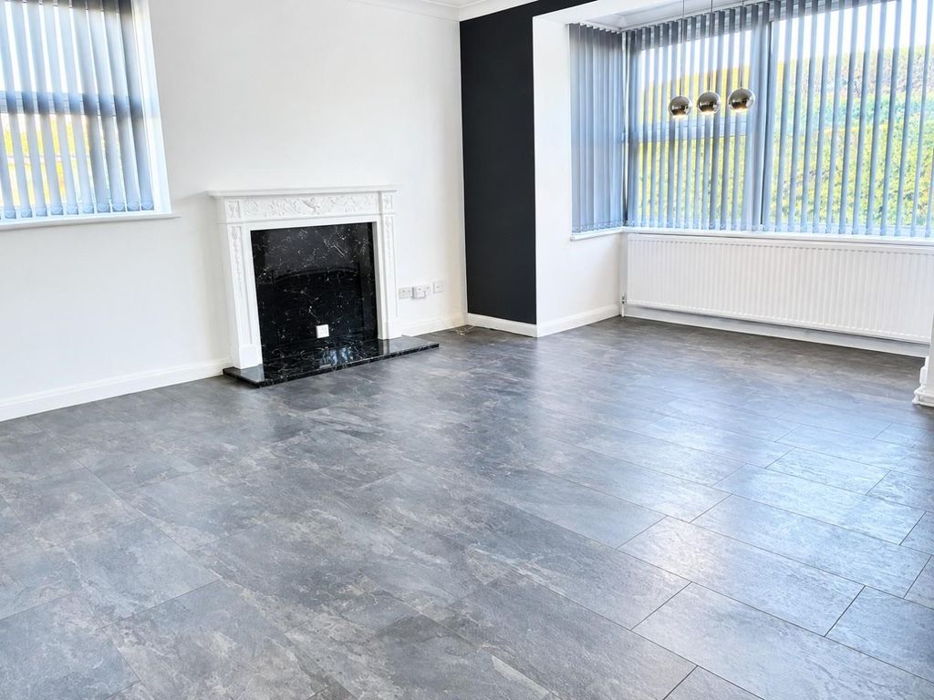 Property photo 2 of 11 Bright Empty Living Room With Ornate Fireplace.Jpg