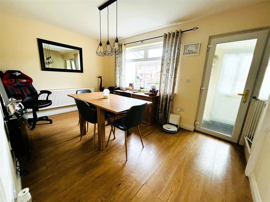 Property photo 3 of 13 Front Living Room