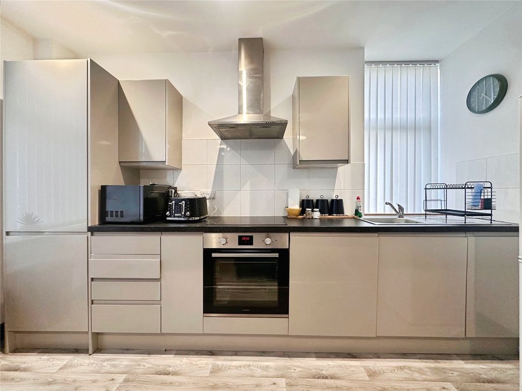 Property photo 3 of 6 Kitchen