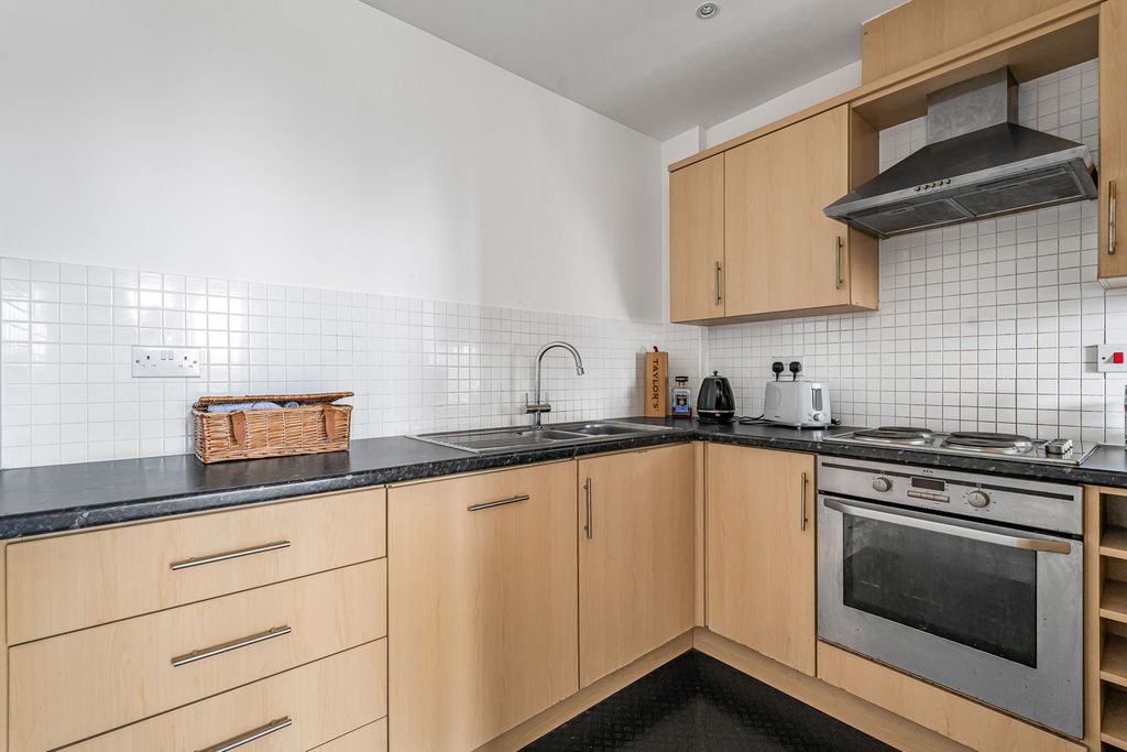 Property photo 3 of 12 Kitchen