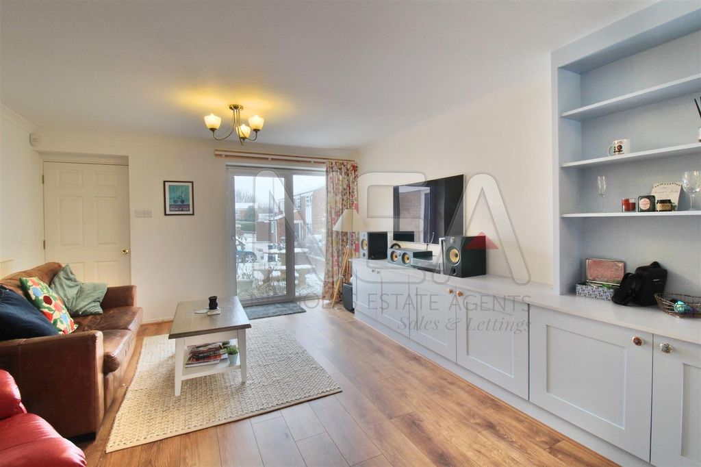 Property photo 1 of 9 Living Area