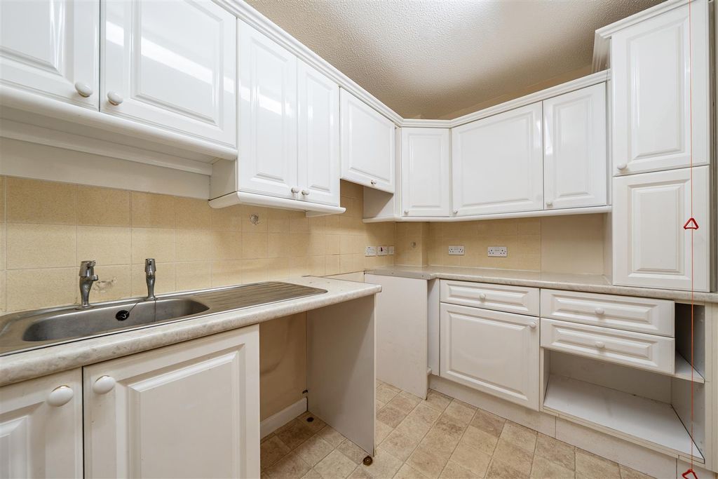 Property photo 3 of 12 Kitchen